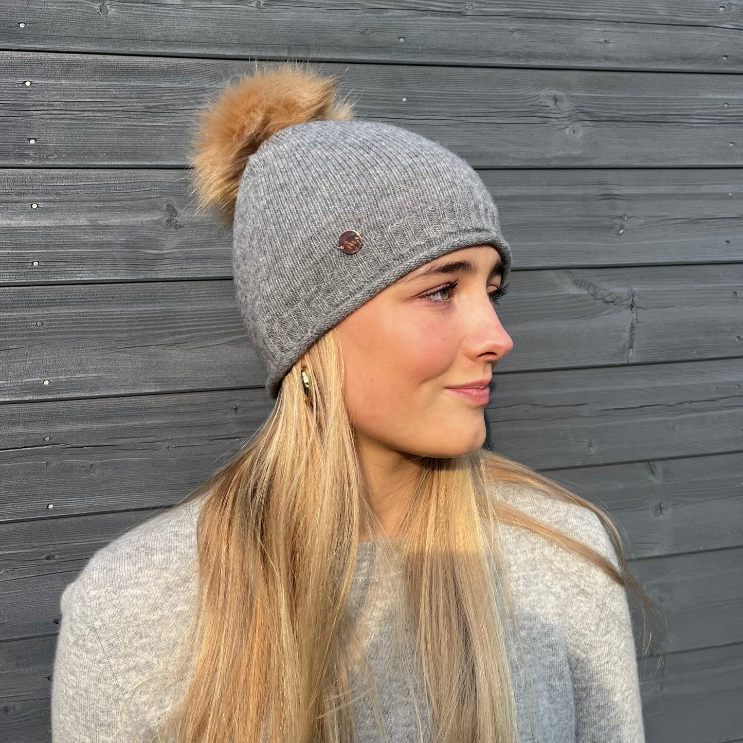 Grey cashmere plain knit beanie with faux fur pom