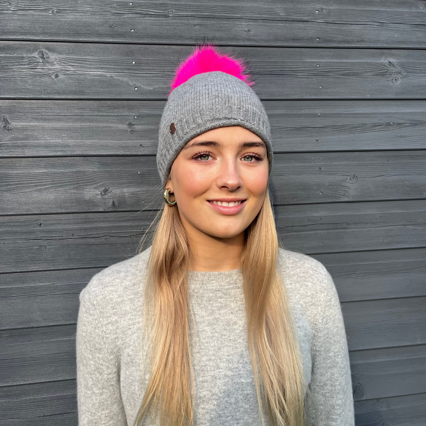 Grey cashmere plain knit beanie with faux fur pom