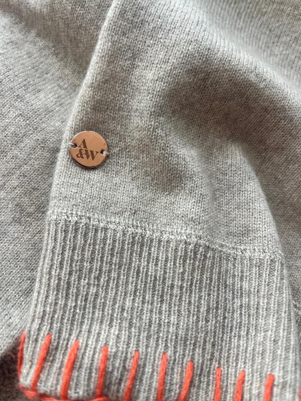 Oatmeal raglan cashmere sweatshirt with orange contrast blanket stitch detail