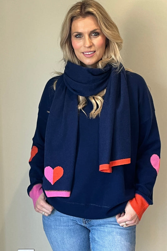 Navy cashmere scarf  with heart intarsia in pink and orange finished with contrast ribbed tips